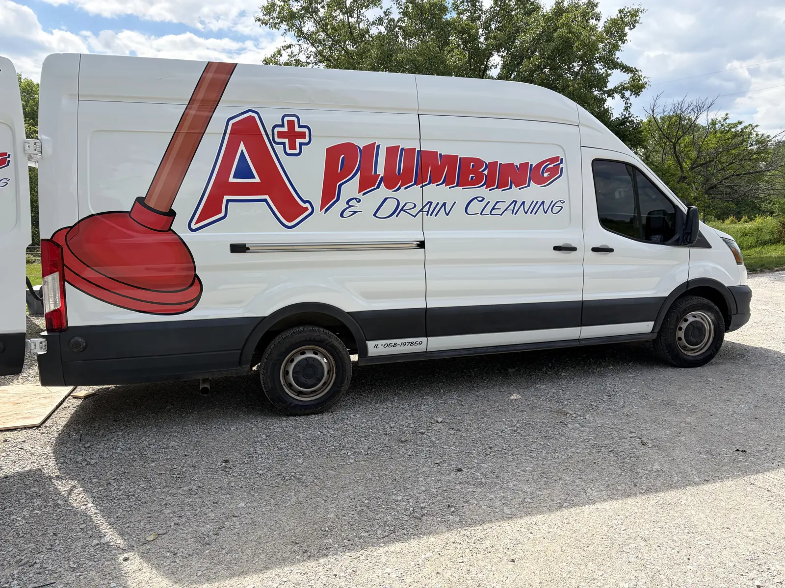 A Plus Plumbing and Drain Cleaning’s branded service van